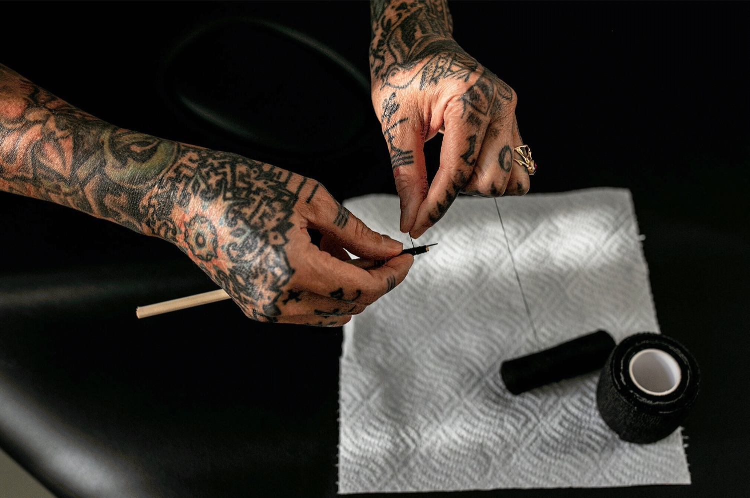 Sialuk Jacobsen uses historical documents, artifacts and Qilakitsoq mummies to research traditional Inuit tattoo designs, which he applies with a hand tool. Credit...Betina Garcia.